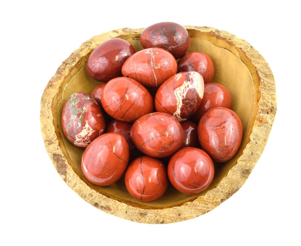 Red Jasper Yoni Egg group in a bowl to show the color variations and stone movements 